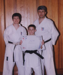 Sensei Lesley (L) Proud Black Belt - Andy Webb (C) Sensei Colin (R)